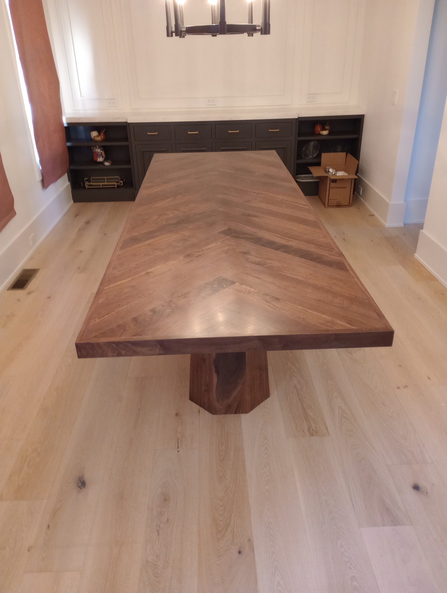 Walnut chevron dining table installed