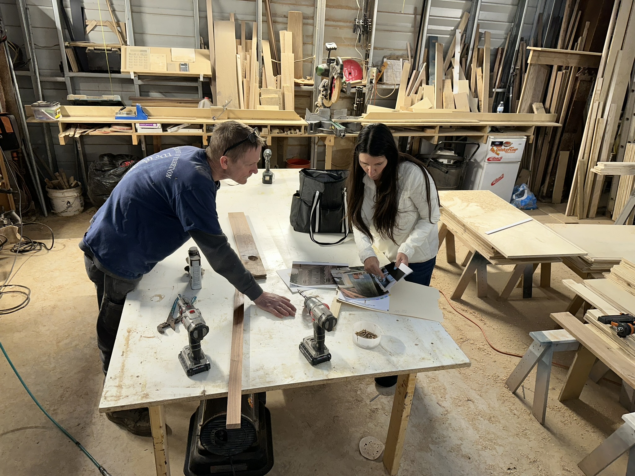 Larry consulting with a client in the workshop
