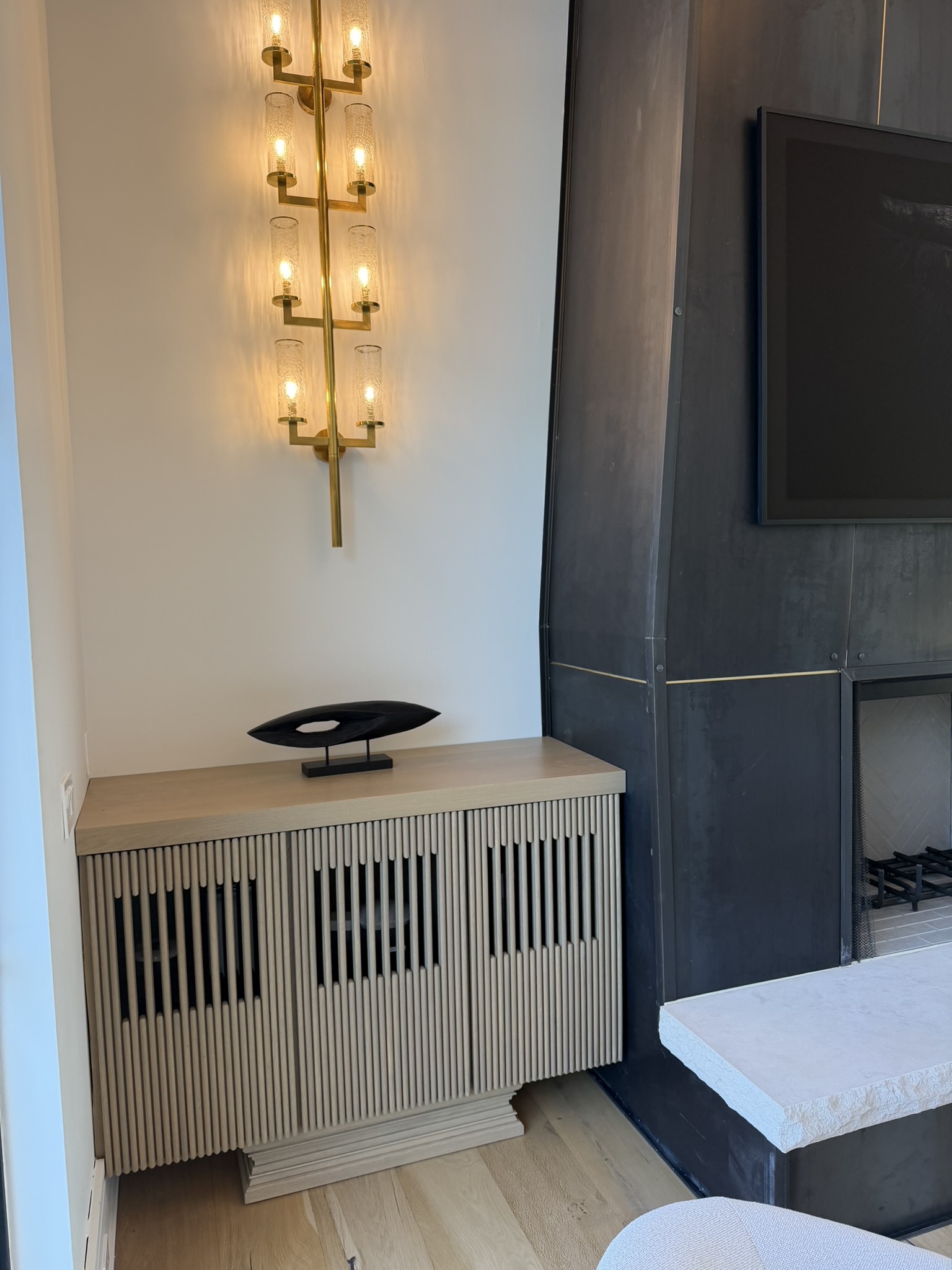 Custom slatted radiator cover installed