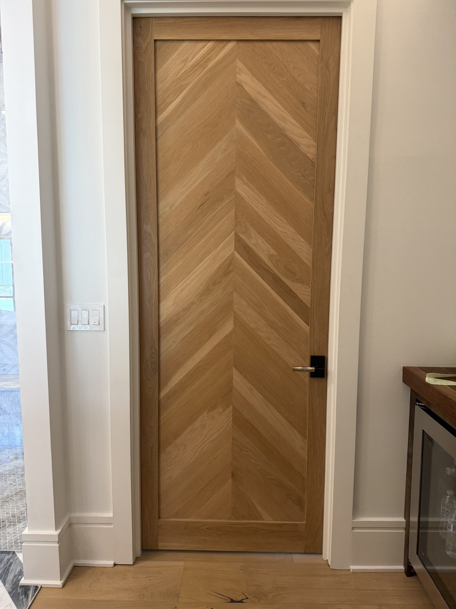 Custom chevron oak interior door