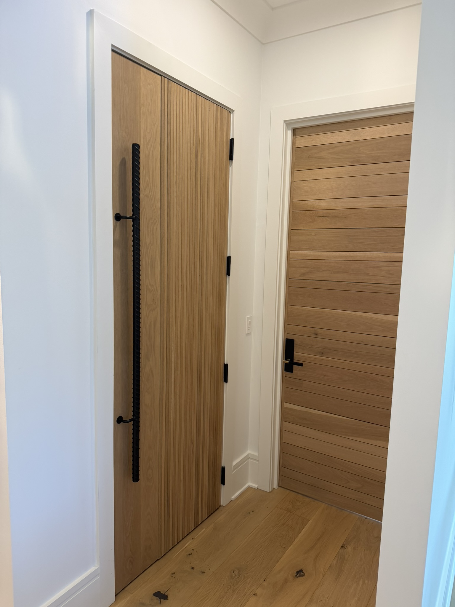 Custom fluted and horizontal slatted oak doors